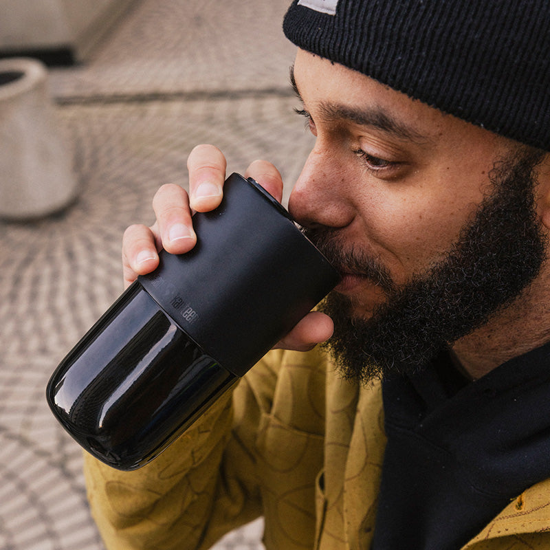 16oz-rise-tumbler-j3 16oz_rise_tumbler_black_man_drink_square.jpg