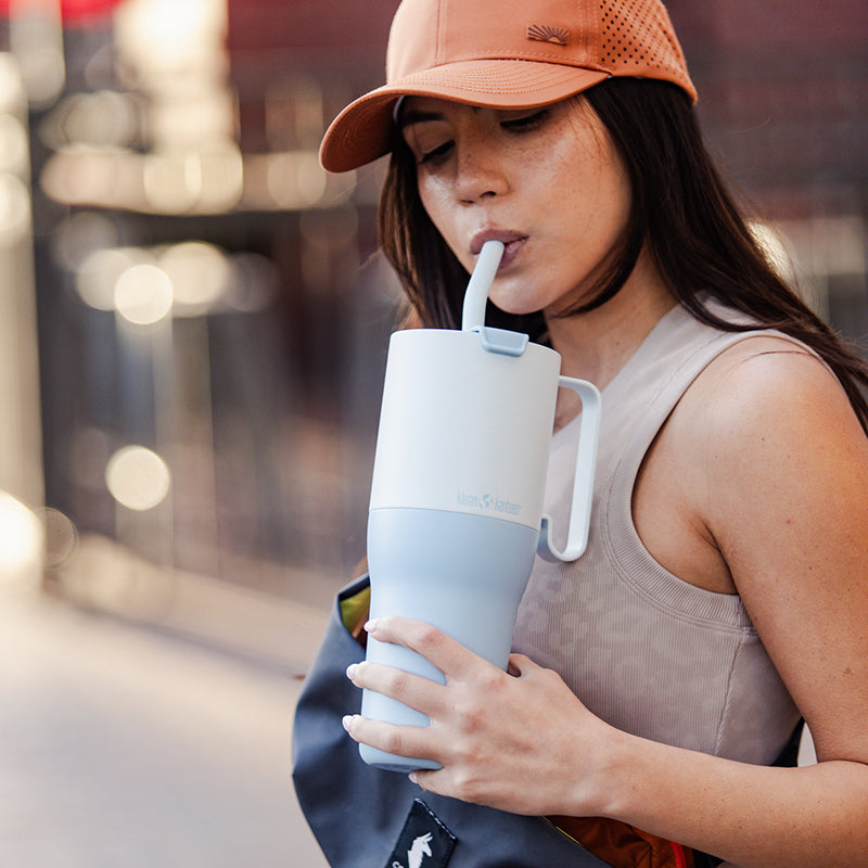 36oz-rise-tumbler-with-straw-lid-e2 36oz_rise_tumbler_straw_girl_sip_square.jpg