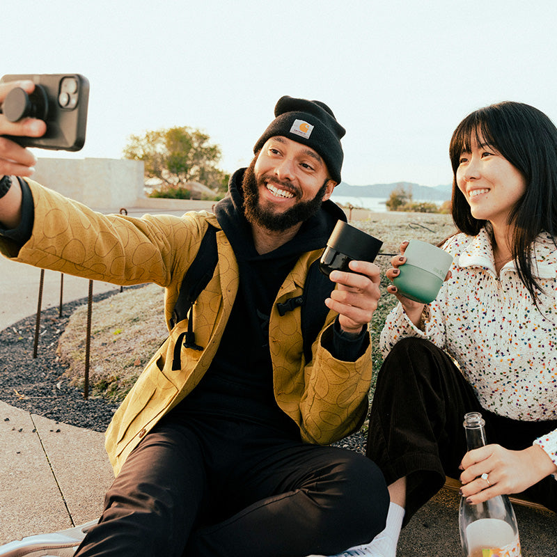 bring-your-own-party-kit-tumblers-and-cocktails-x4 8oz_rise_lowball_black_iceberg_couple_selfie_city_square.jpg