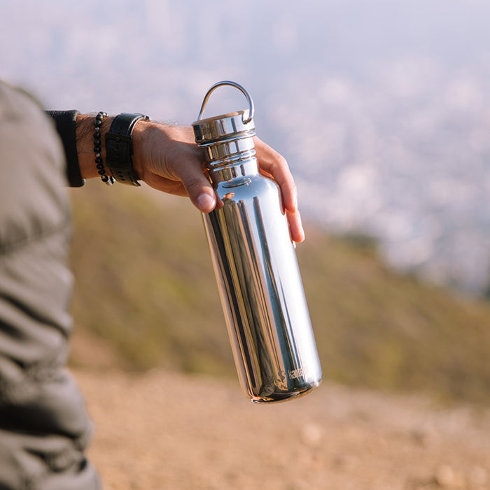 27oz-reflect-with-bamboo-cap-v5 K27SSLRF-MS-BAMBOO_reflect_bottle_hand_lifestyle.jpg